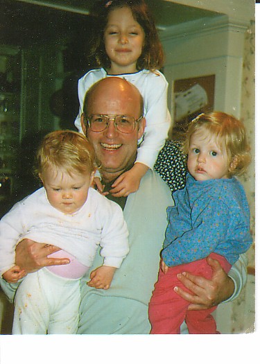 Bill Greenfield, surrounded by three of his granddaughters - Allie Lanham, Rachel Feldman, and Debi Feldman